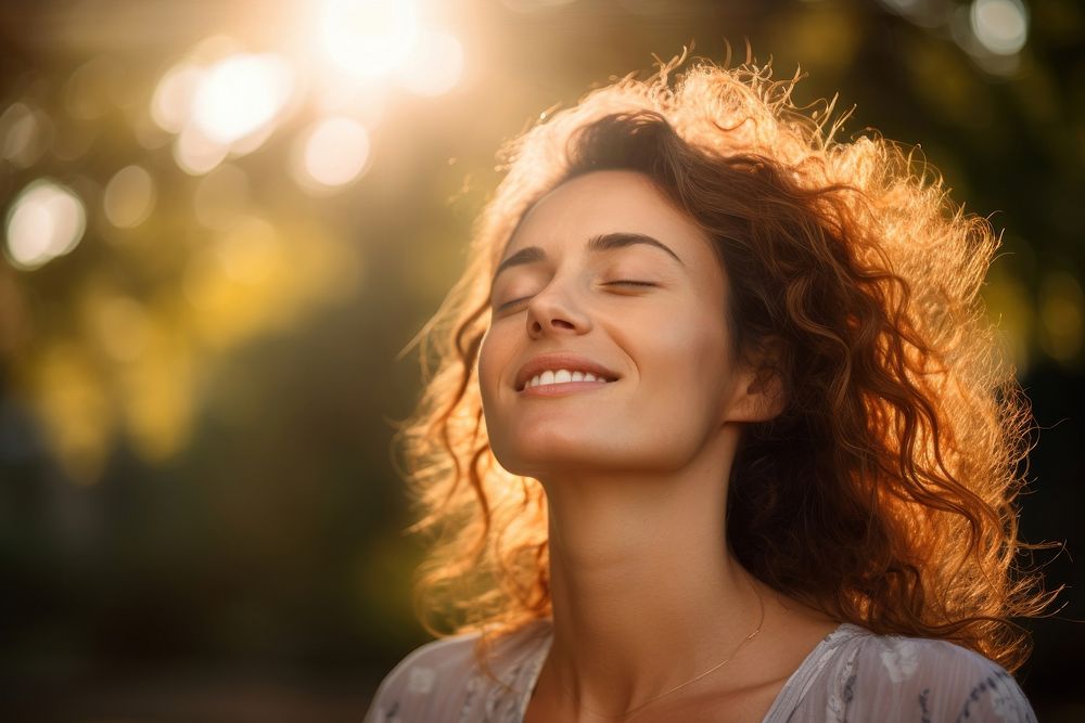 Relaxed woman laughing outdoors smile. AI generated Image by rawpixel.
