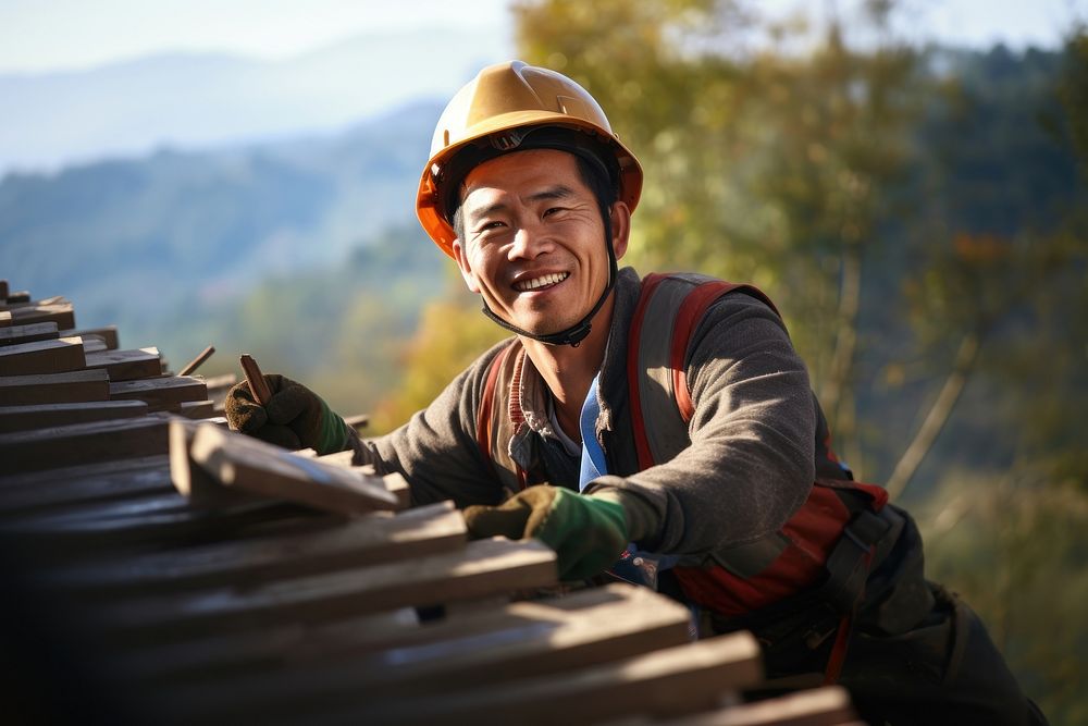 Asian construction worker smiling hardhat helmet. 