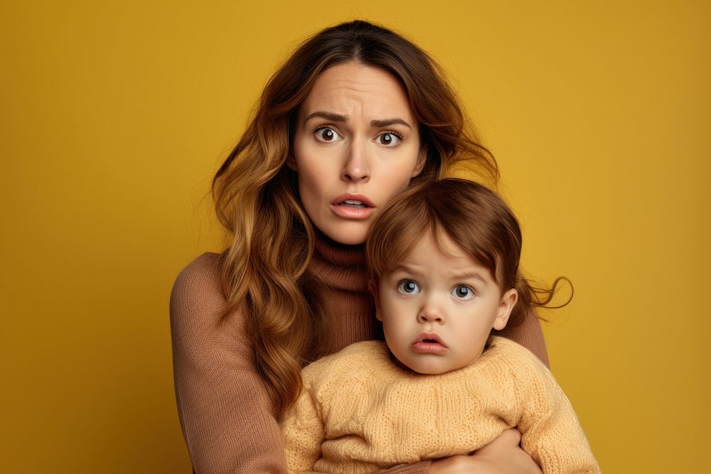 Shocked mother portrait child photo. 