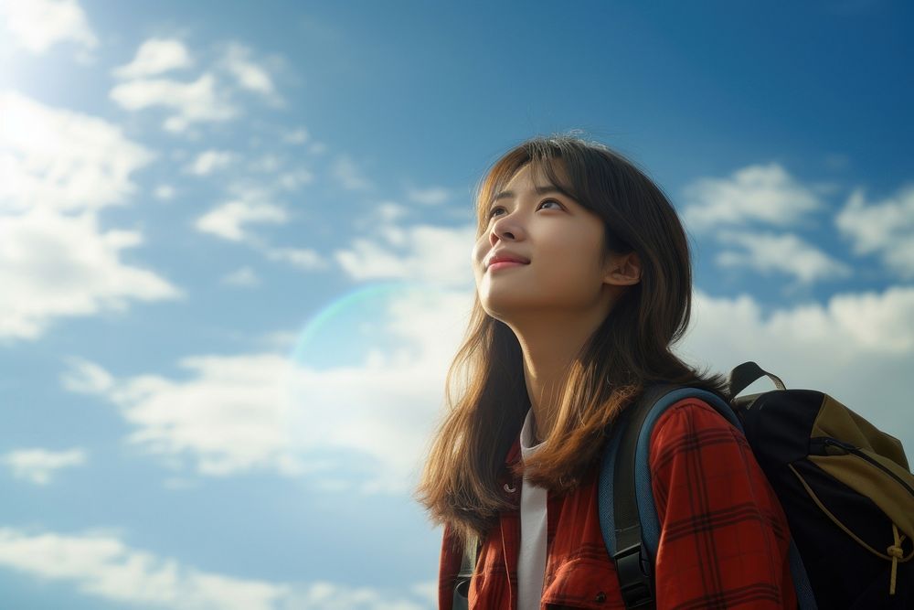 Teenager study abroad backpack sky portrait. 