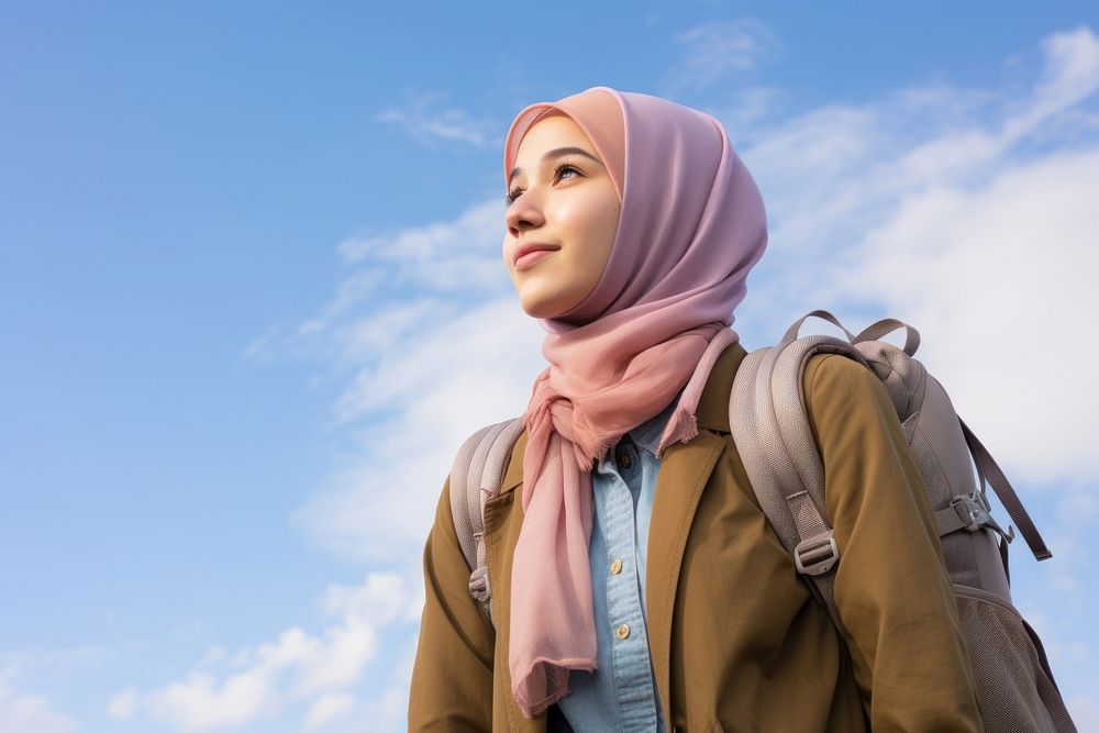 Teenager study abroad backpack looking scarf. 