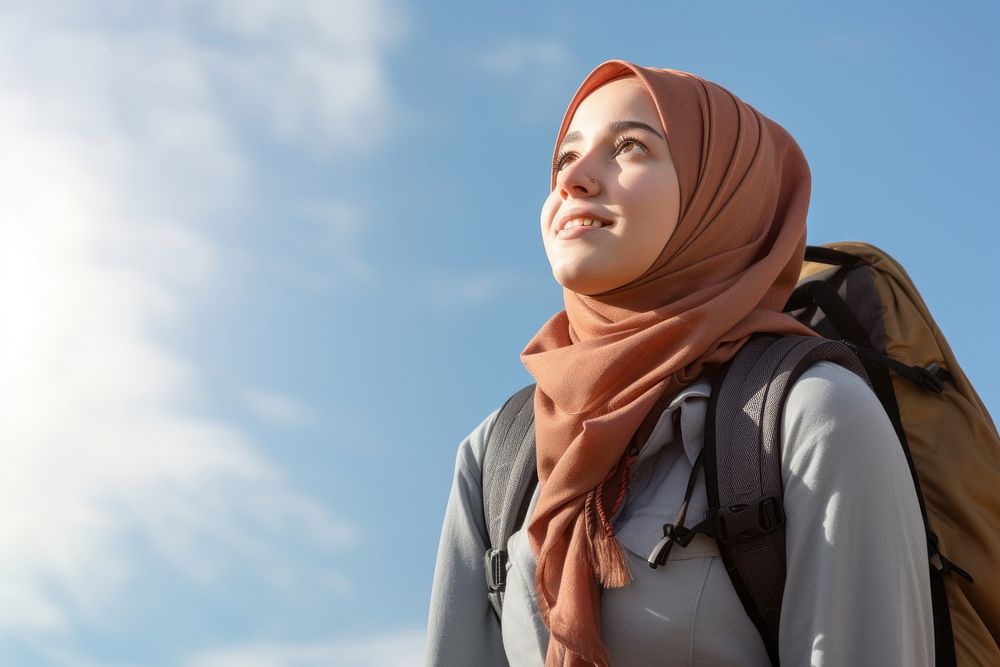 Teenager study abroad looking scarf hijab. 