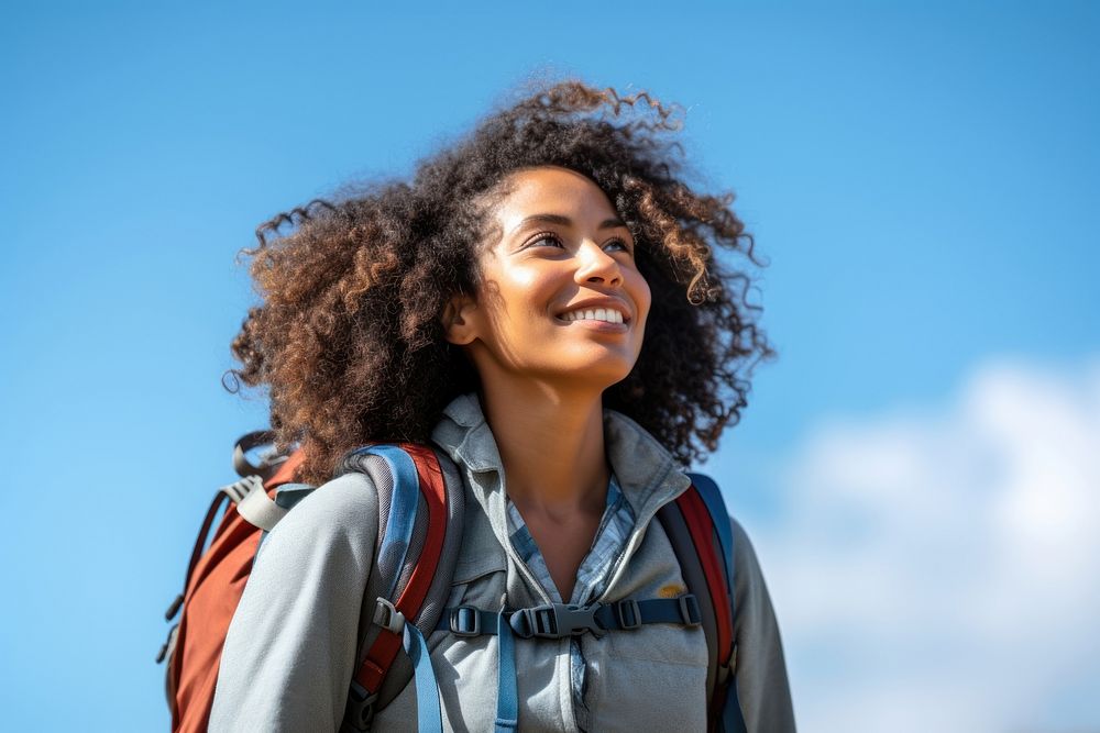 Indian woman hiking backpack looking smile. AI generated Image by rawpixel.