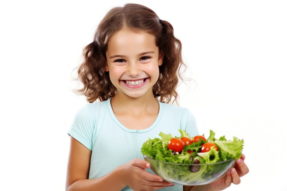 Girl eating salad child smile happy. AI generated Image by rawpixel.