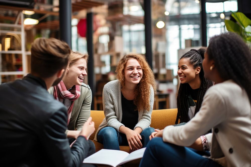 Student college meeting laughing adult togetherness. 