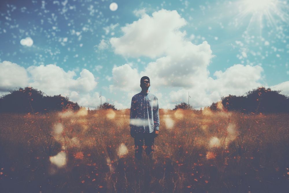 Man standing in meadow. 