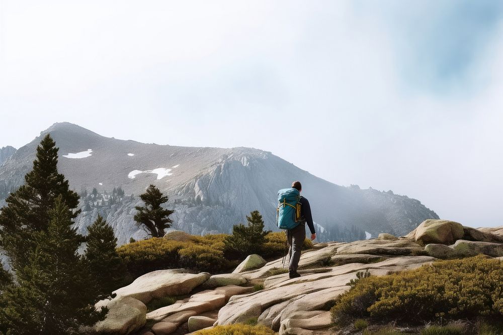 Photo of a hiking man, clear sky. .