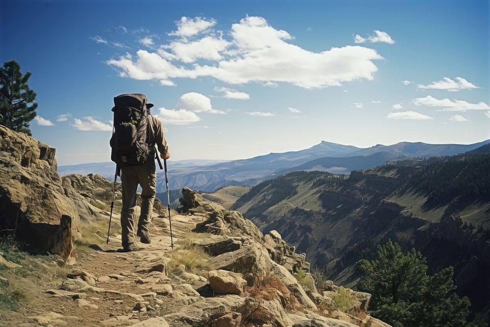 Photo of a hiking man, clear sky. AI generated image by rawpixel.