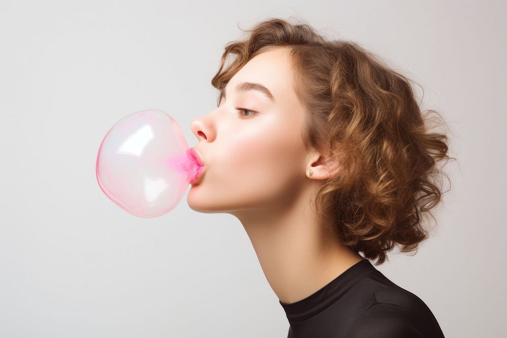 Blond woman blowing bubble gum. AI generated image by rawpixel.