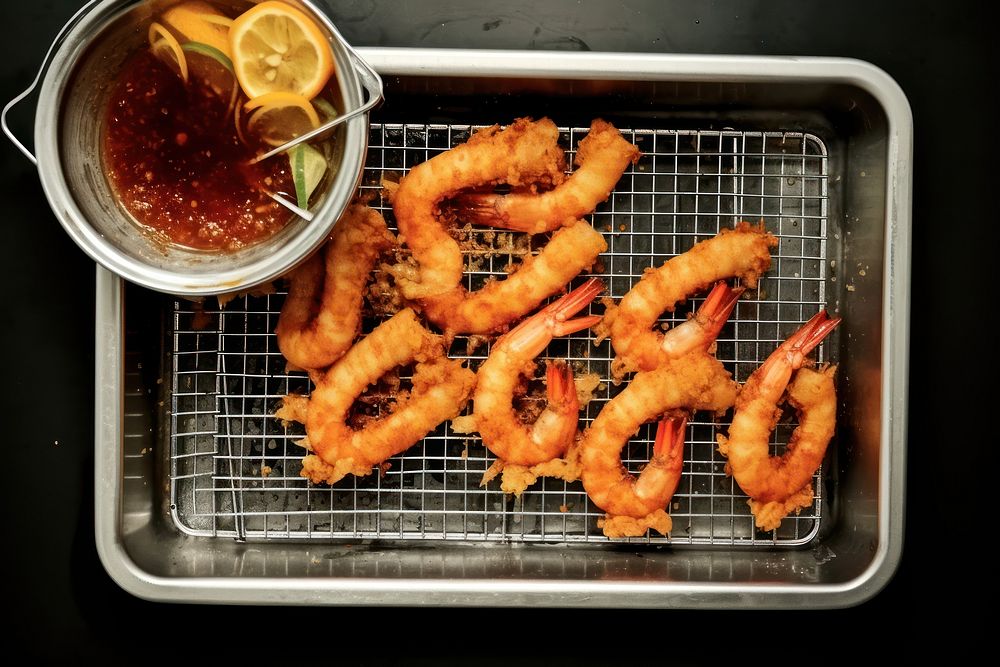 Fried shrimp grilling table food.