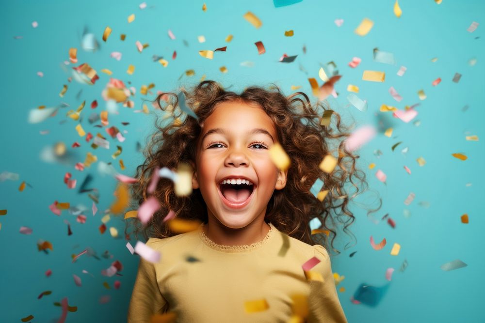 Happy birthday child girl laughing confetti celebration. AI generated Image by rawpixel.