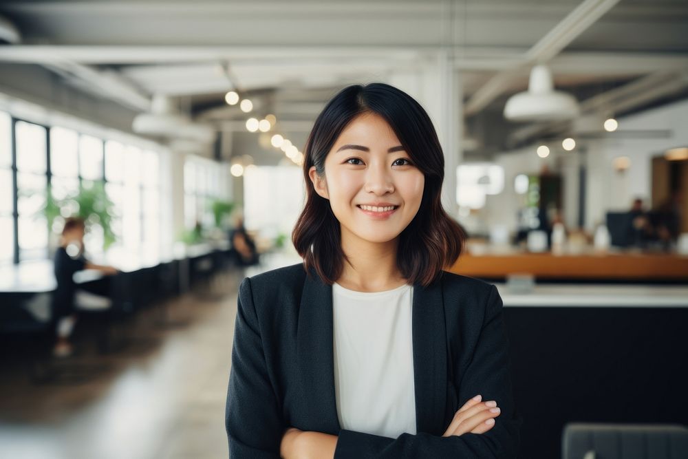 Happy japanese woman smiling standing portrait office. AI generated Image by rawpixel.