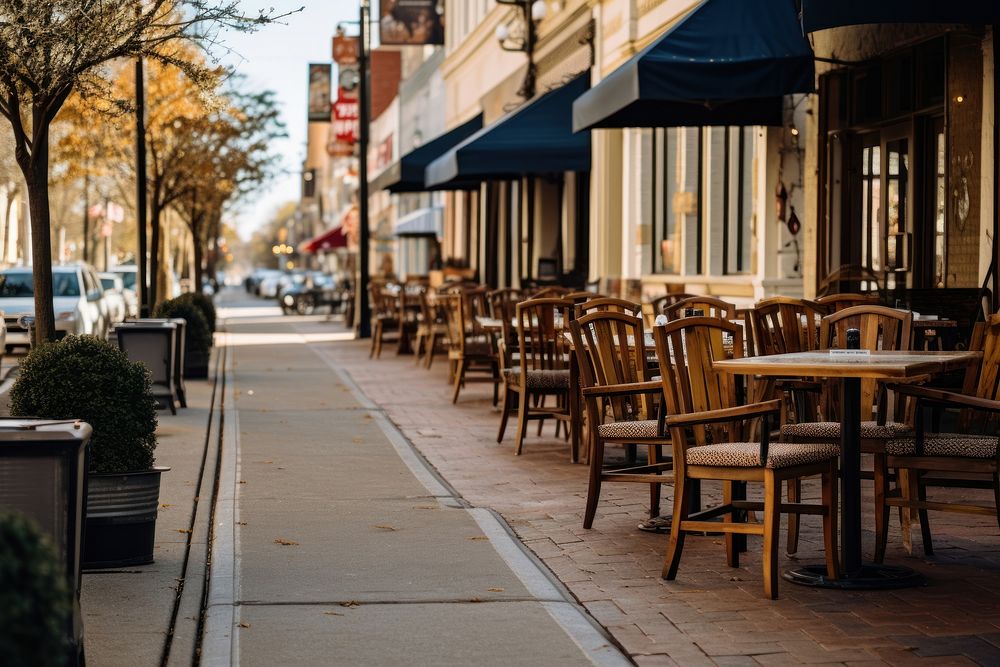 Sidewalk with tables street chair restaurant.