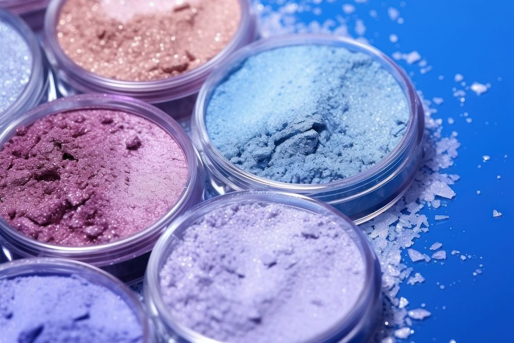 Eye palette makeup glitter powder blue variation. AI generated Image by rawpixel.