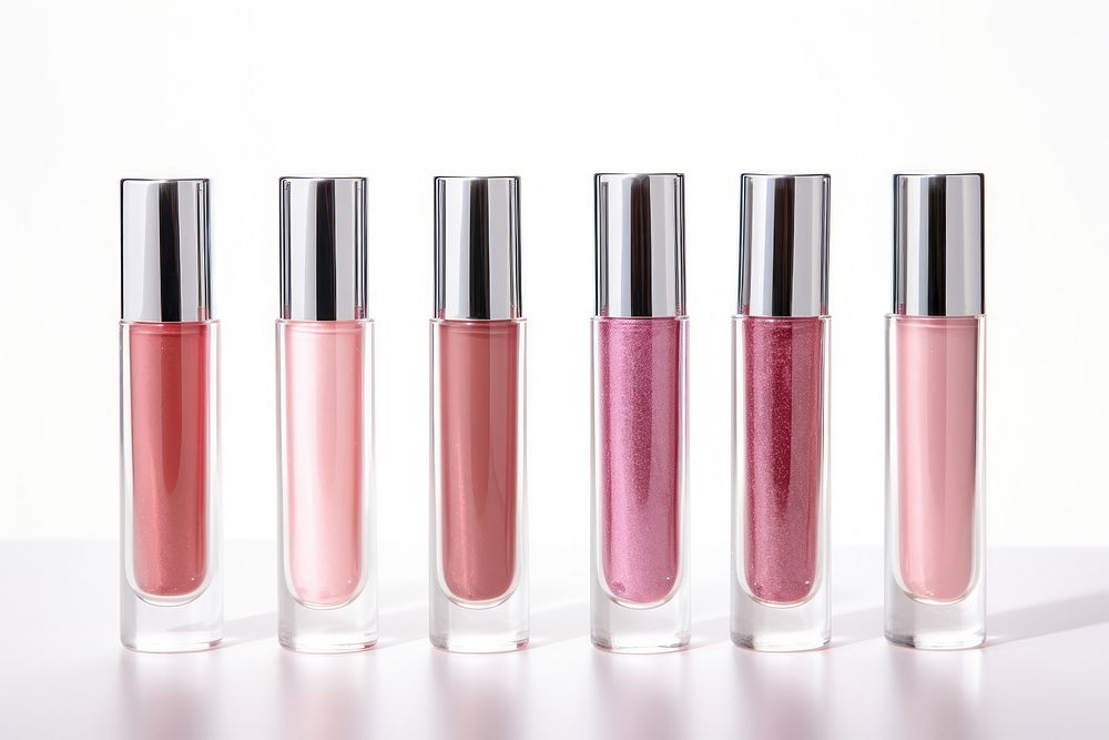 Lip gloss tubes cosmetics white background laboratory. AI generated Image by rawpixel.