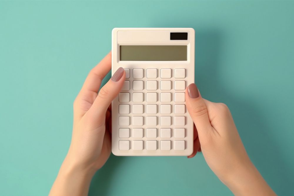 Woman hand calculator mathematics electronics. AI generated Image by rawpixel.