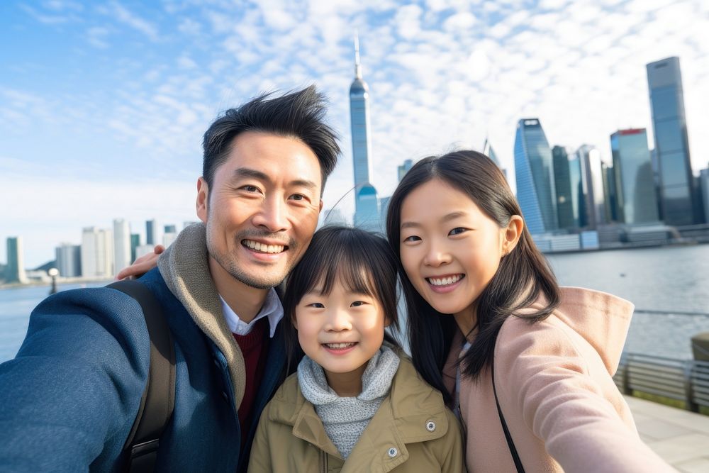 Family taking selfie photo city architecture building. 