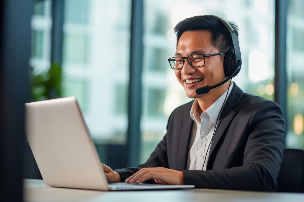 Men working laptop headphones computer. AI generated Image by rawpixel.