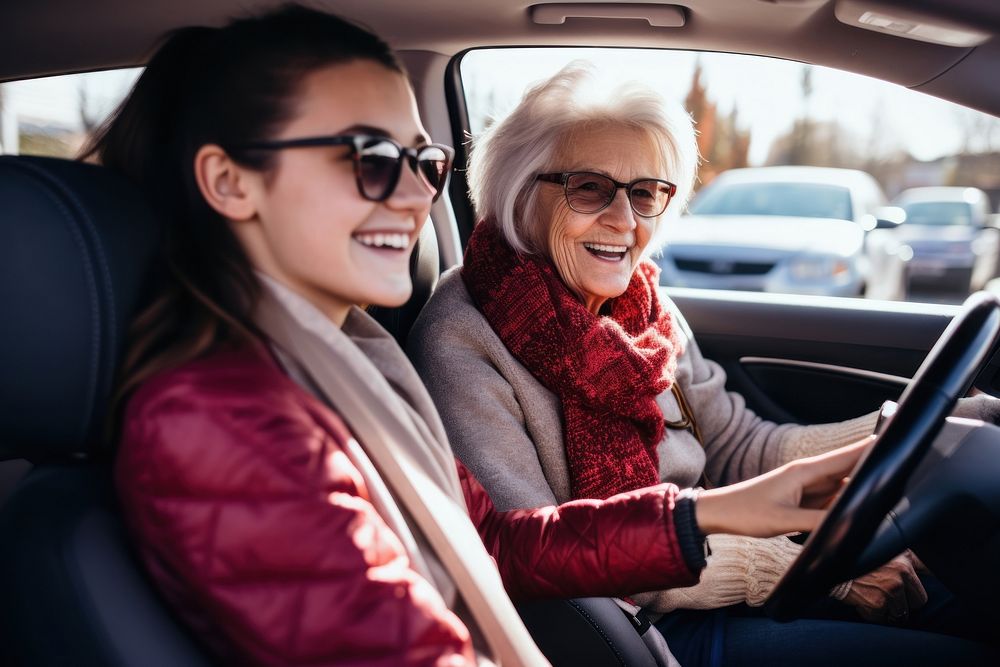 Grandmother and her daughter in a car. .