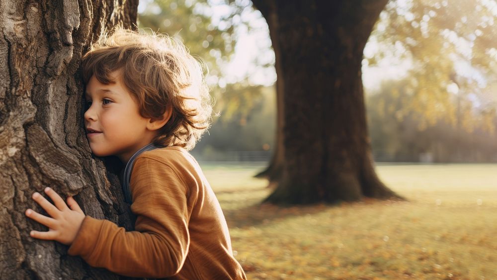 Little boy hugging a tree. | Free Photo - rawpixel