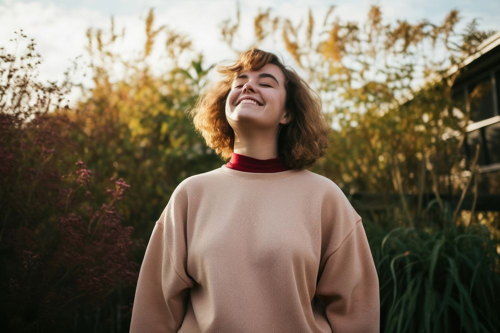 Girls wearing a sweatshirt outdoors adult happy. 