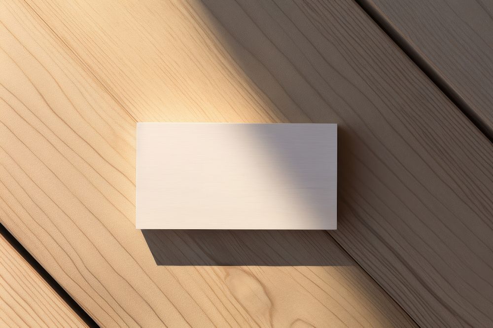Business card wood shadow paper. AI generated Image by rawpixel.