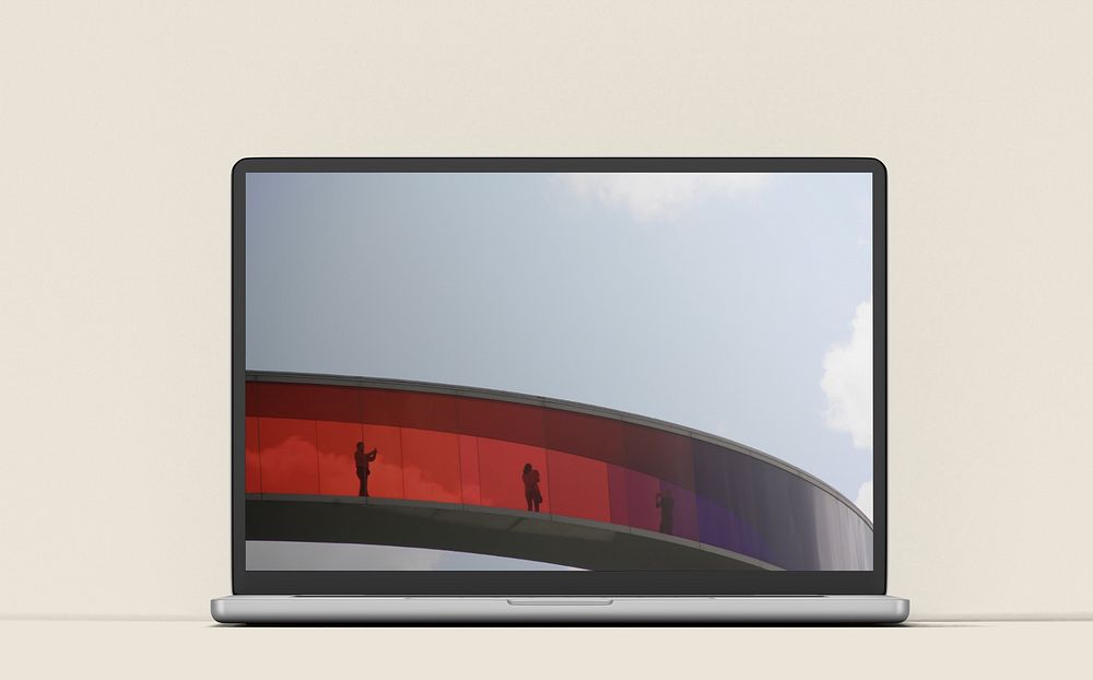 Laptop screen with architecture wallpaper