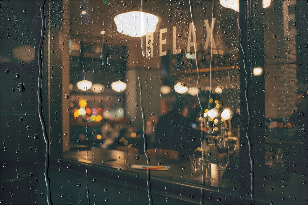 Cafe at night with rain effect