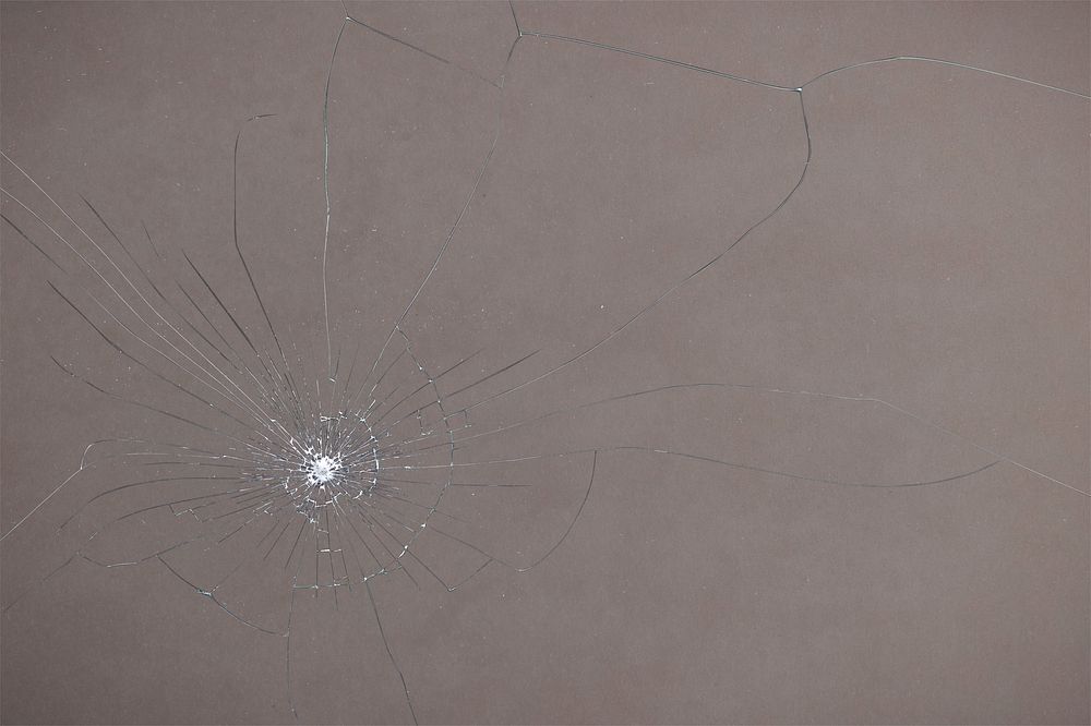 Plain brown background with broken glass effect
