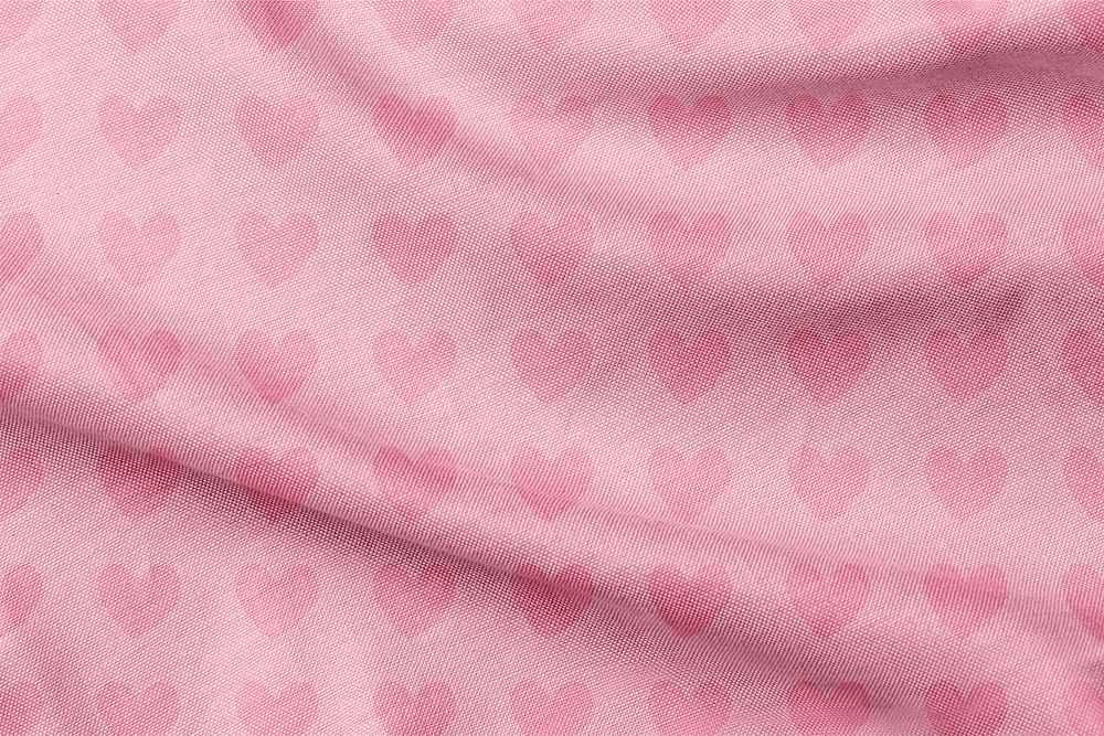 Pink heart printed textile texture