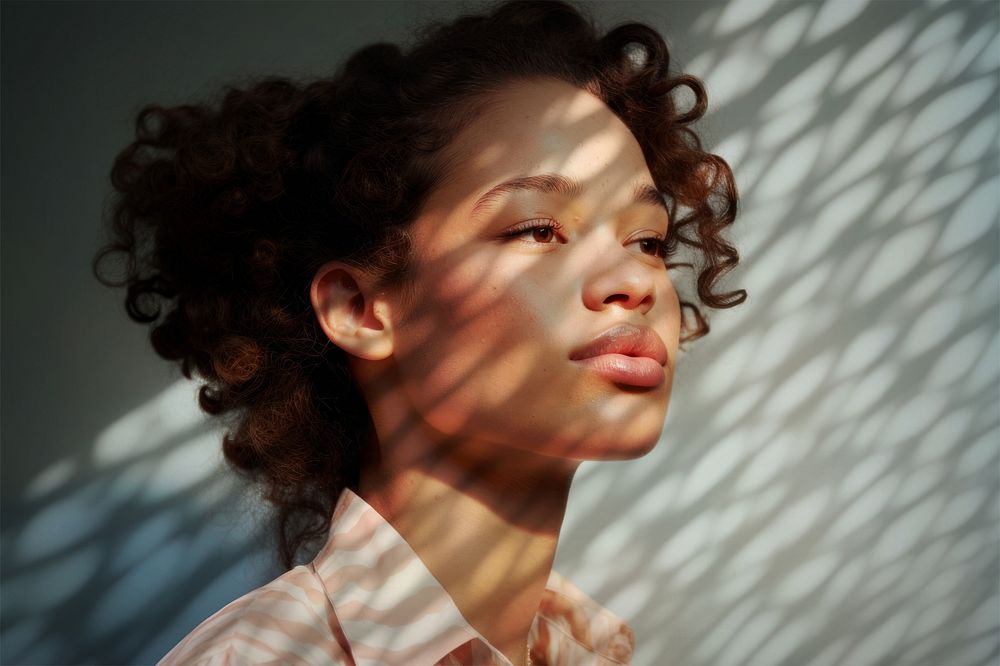 Aesthetic woman portrait, natural light shadow