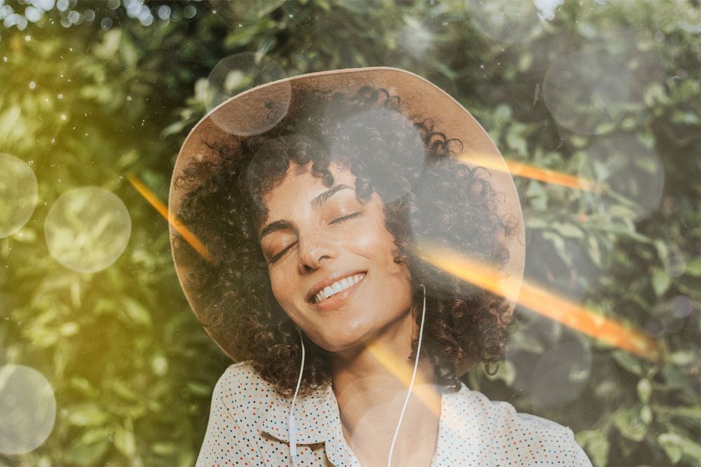 Woman listening to music  image with bokeh effect
