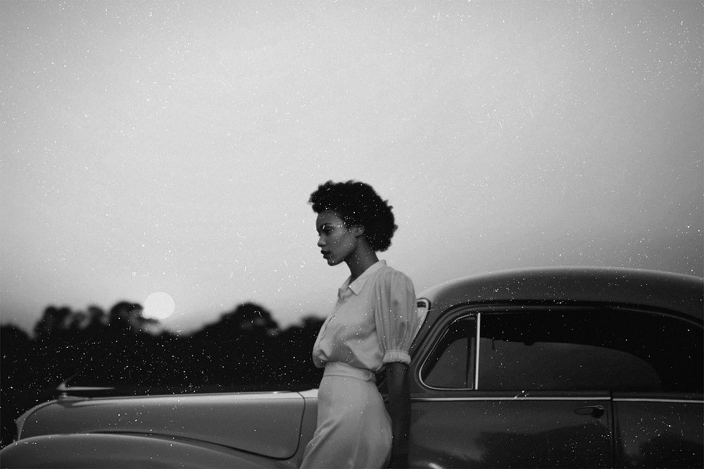 Woman with classic car photo with vintage effect