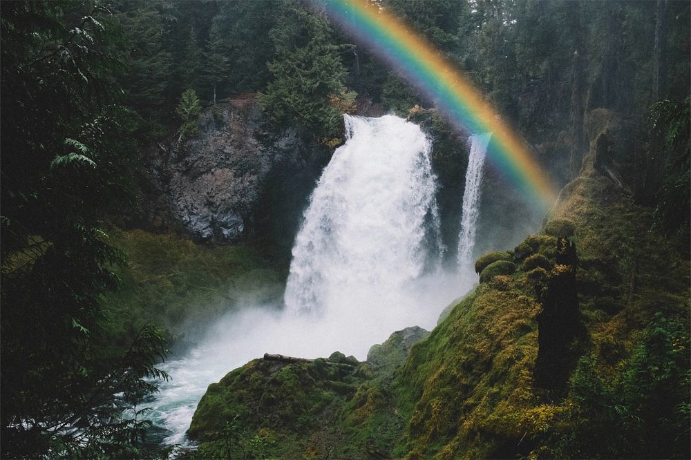 Beautiful waterfall photo with rainbow effect