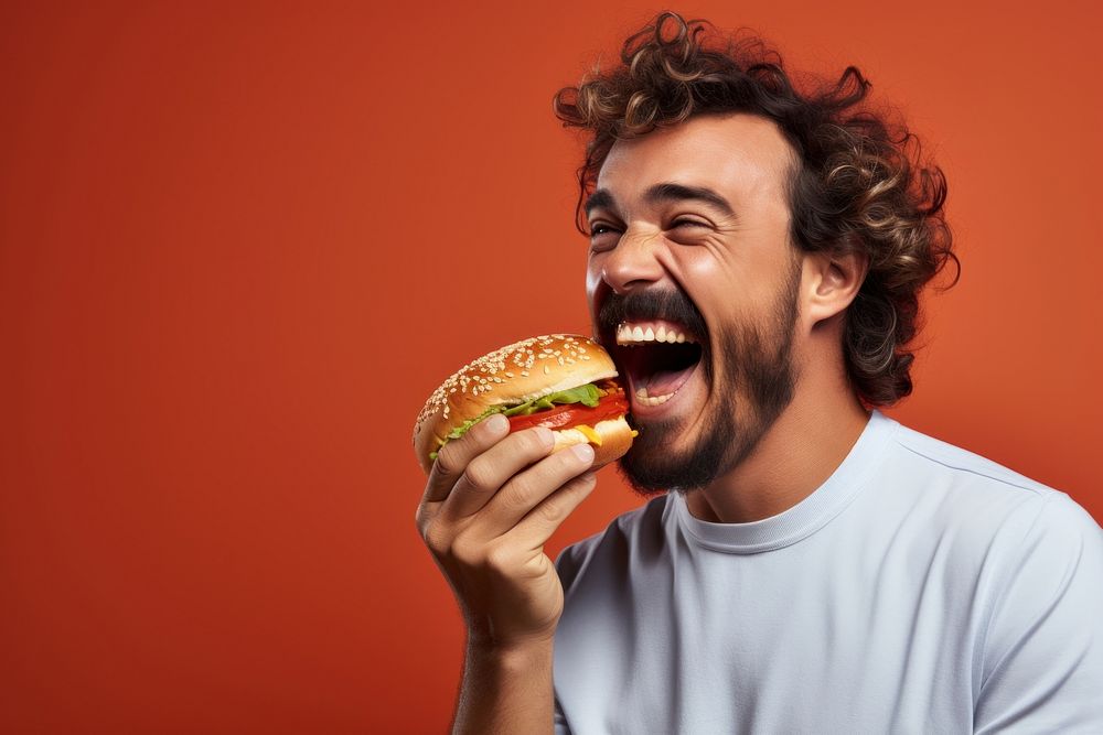 Biting burger adult happy. AI generated Image by rawpixel.