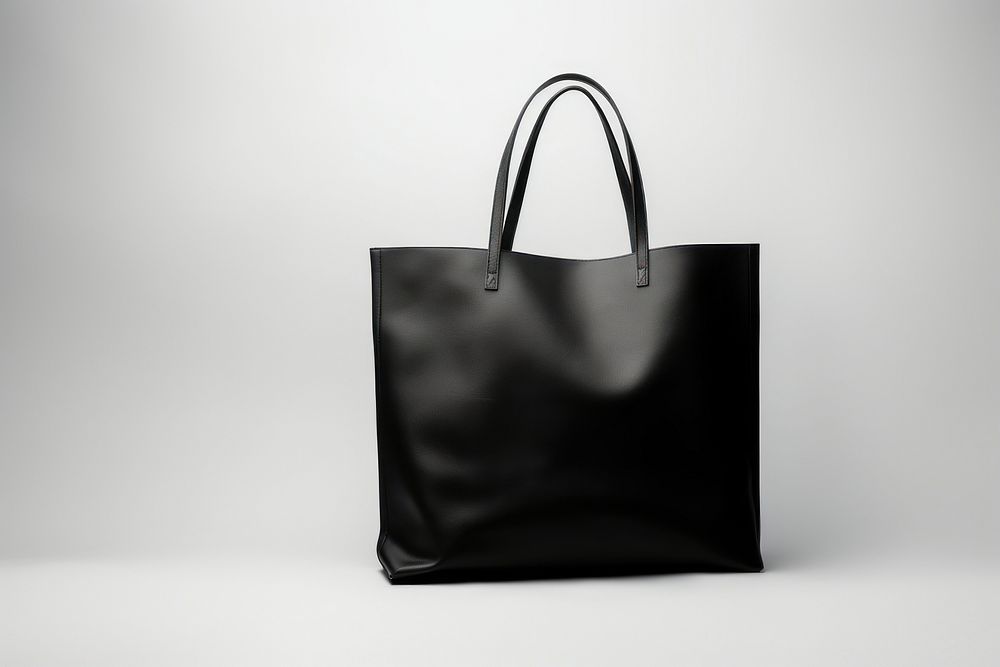 Tote bag handbag black white background. AI generated Image by rawpixel.