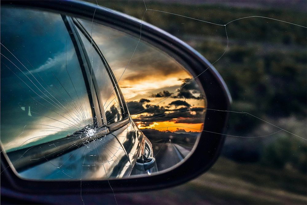 Car side mirror with broken glass effect