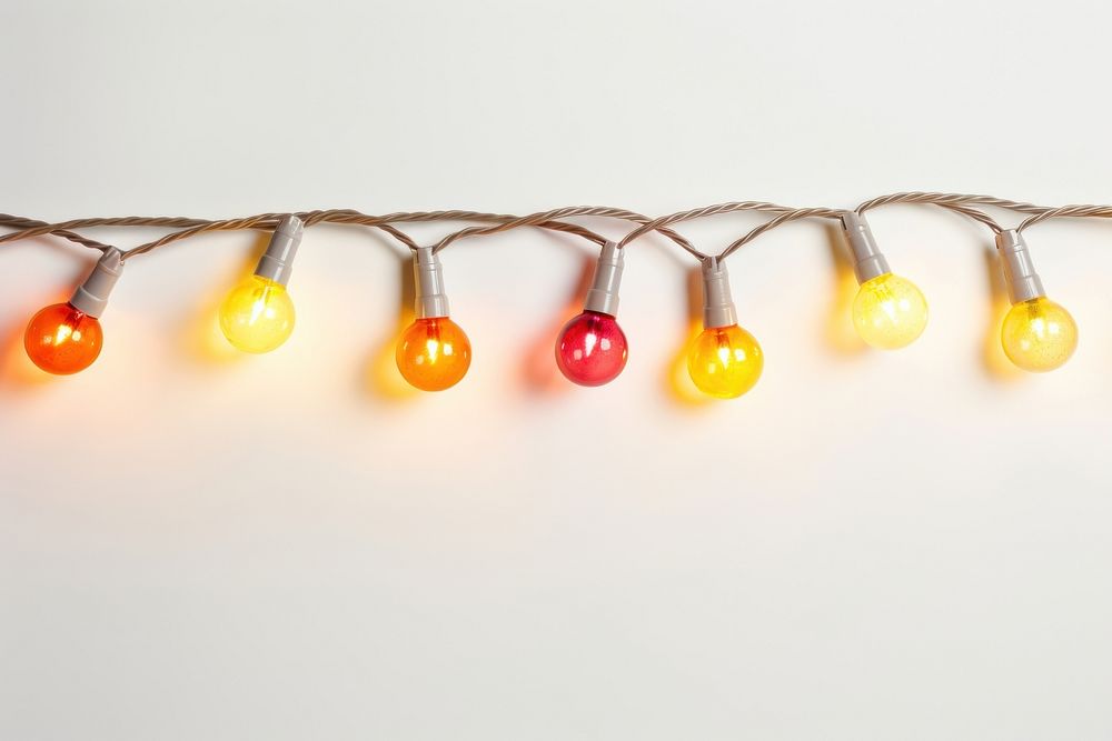 Christmas string lights lightbulb lighting white background. AI generated Image by rawpixel.