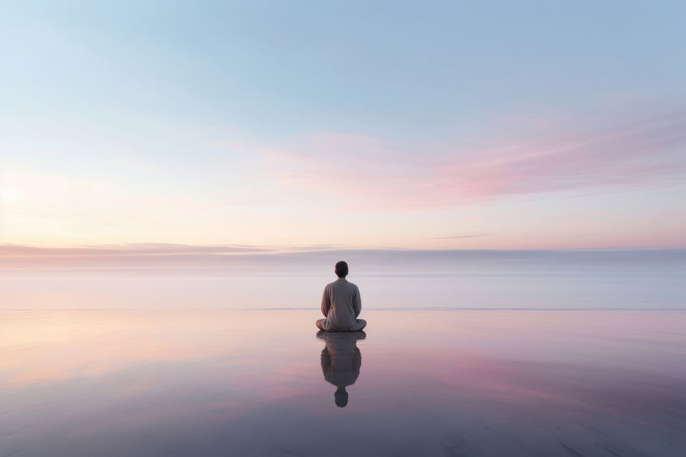 Beach sky meditating outdoors. AI generated Image by rawpixel.