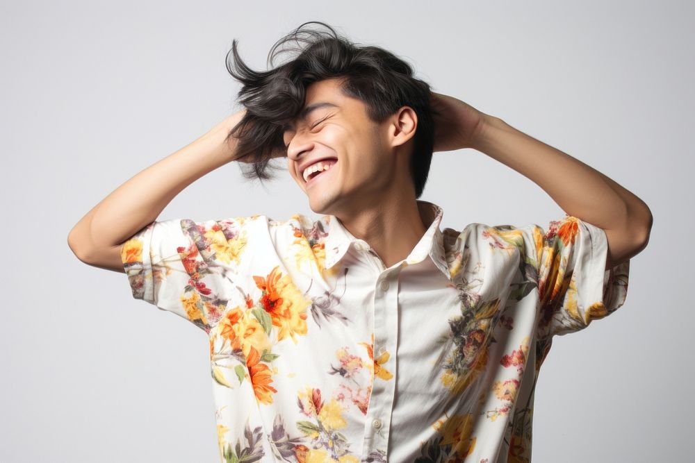 Happy asian male trans laughing smile shirt. AI generated Image by rawpixel.