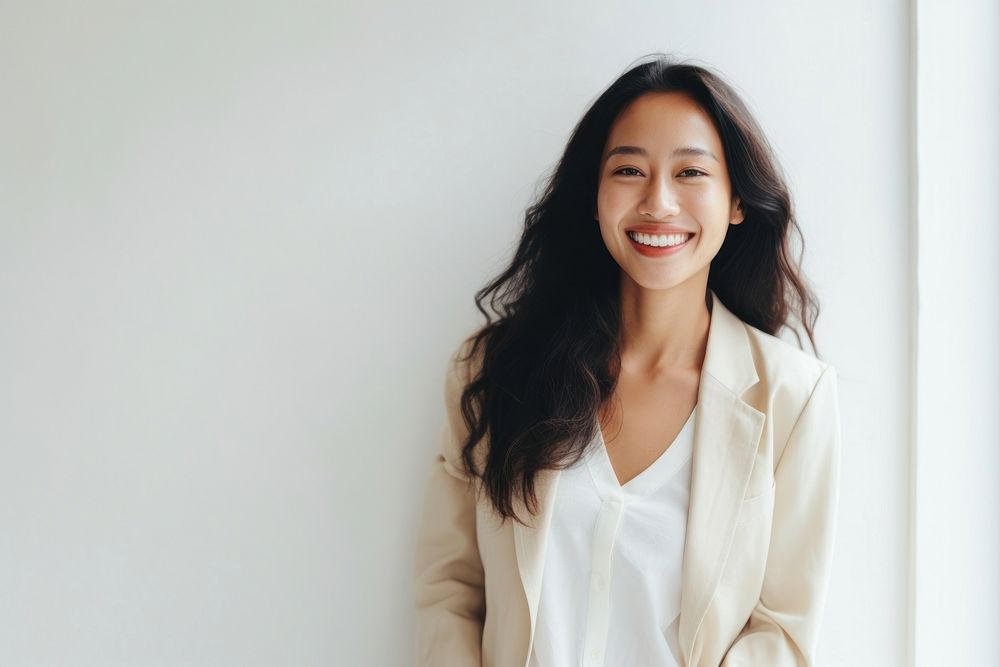 South east asian businesswoman laughing smile adult. AI generated Image by rawpixel.