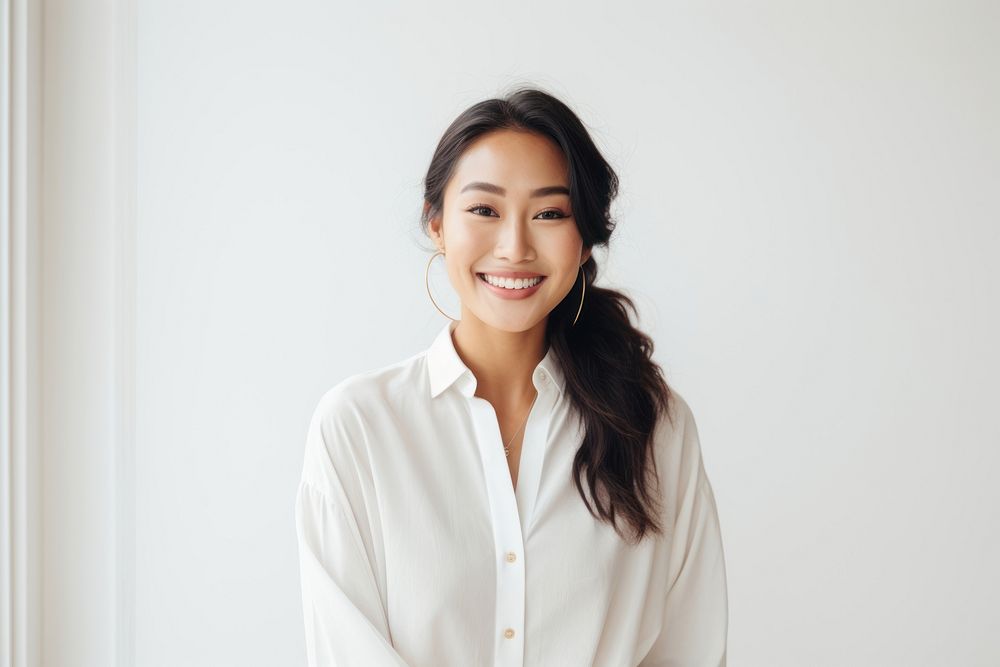 South east asian businesswoman smile happy human. AI generated Image by rawpixel.