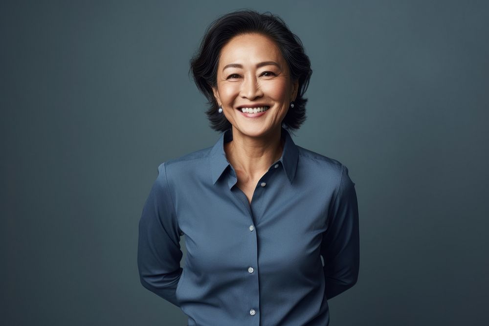 South east asian businesswoman laughing adult smile. AI generated Image by rawpixel.