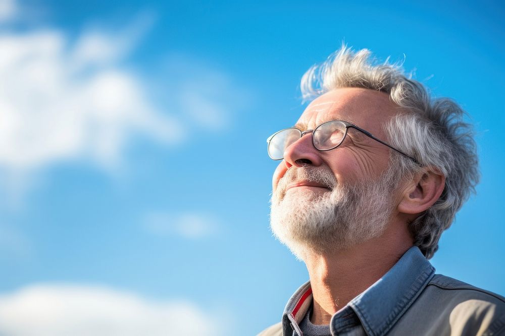 Senior man looking sky photography portrait glasses. AI generated Image by rawpixel.