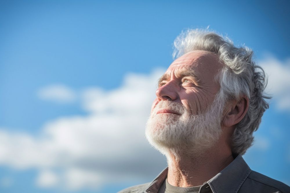 Senior man looking sky photography portrait adult. AI generated Image by rawpixel.