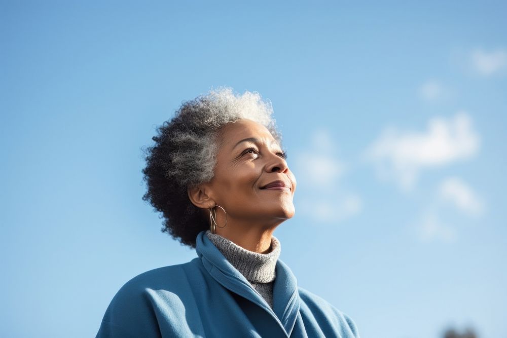 Senior black woman looking sky photography portrait adult. AI generated Image by rawpixel.