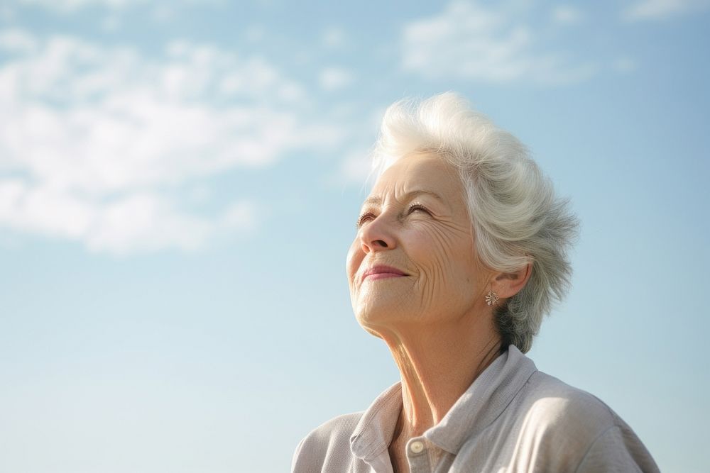 Senior woman looking sky photography portrait adult. AI generated Image by rawpixel.