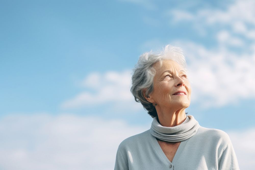 Senior woman looking sky adult contemplation retirement. AI generated Image by rawpixel.