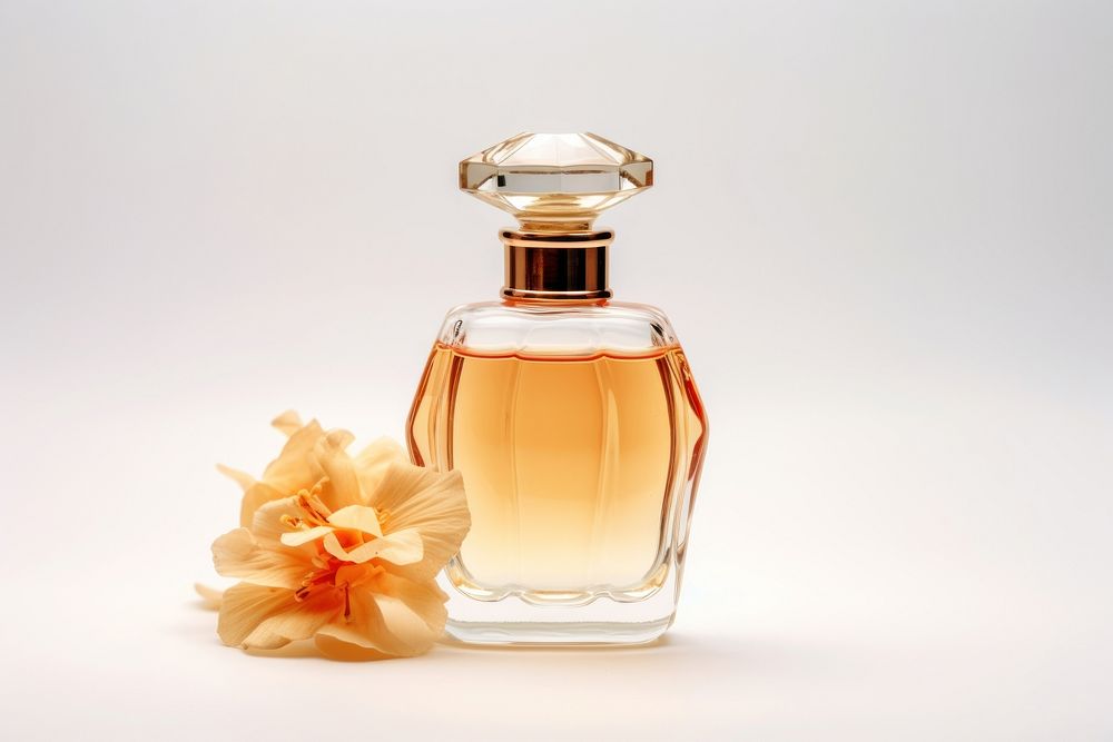 Perfume rounded bottle cosmetics flower white background. AI generated Image by rawpixel.