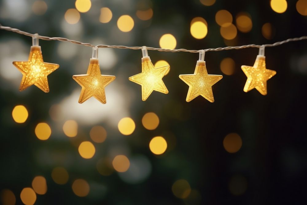 Gold star light christmas hanging illuminated. AI generated Image by rawpixel.